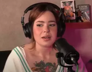 Visibly disturbed by what Ian is saying.