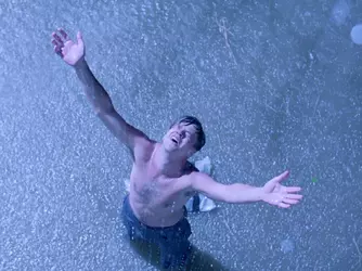 shawshank-redemption-tim-robbins-andy-dufresne-rain-scene.webp