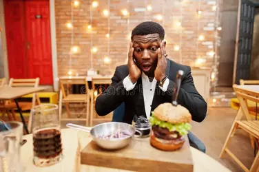 african-american-man-burger-surprised-face-respectable-young-african-american-man-black-suit-...webp