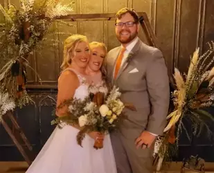 abby-and-brittany-hensel-married-101124-2-e856b19c8756460183929449bd1ca775.webp