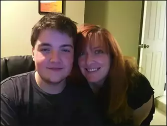 Null with his mom.webp