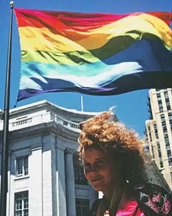 lynn-segeblom-with-flag-1978.webp