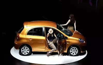 geneva-models-pose-next-to-the-new-nissan-micra-during-the-second-press-day-at-the-80th-geneva.webp