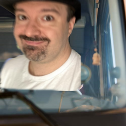 truck-driver-in-cab-front-view.webp