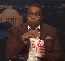jon-stewart-popcorn-gif-9.gif