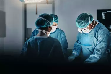 0_Surgeon-team-people-and-operating-room-at-hospital-in-scrubs-ppe-and-help-for-emergency-hea...webp 0_Surgeon-team-people-and-operating-room-at-hospital-in-scrubs-ppe-and-help-for-emergency-hea...webp