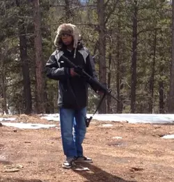 Chris Alford With Gun.webp