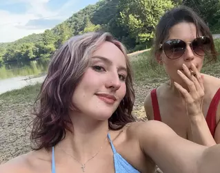 Binturong smoking weed with Emily Youcis.webp